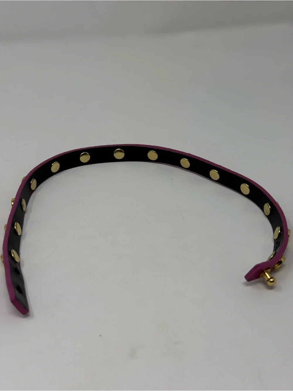 Magenta Tory Burch double-wrap leather bracelet accented with gold-tone logo